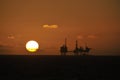 Sunset and Oil platform