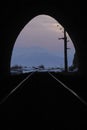 Sunset on the old Circum-Baikal railway, view through the tunnel Royalty Free Stock Photo