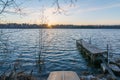 Sunset with old dock and old row boat on small remote lake in Northern Wisconsin Royalty Free Stock Photo