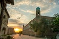 Sunset in old town of old Khiva and blue-green heads of Minarets