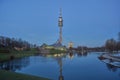 Sunset in the Olympiapark in Munich with view on the lake and tower