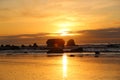 Sunset at one of New Zealand`s most dramtic bits of scenery, Motukiekie Royalty Free Stock Photo
