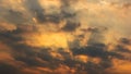 sunset orange beam sky background with white clouds cumulus floating soft focus, copy space