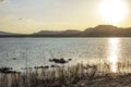 Sunset orange lake water reflection landscape. Sunset water reflection. River sunset orange view. Royalty Free Stock Photo