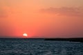 Sunset orange and red colors landscape, sea and sun with deep sky background..Uninhabited islands of the Red Sea, Egypt, Africa. Royalty Free Stock Photo