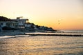Sunset with orange sky along the coast of Chelem, Mexico Royalty Free Stock Photo