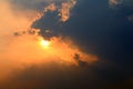 Sunset, orange sky sun sets over cloud dark, gold sky sun lighten clouds evening Royalty Free Stock Photo