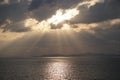 Sunset over the Aegean Sea over the islands in the cloudy sky Royalty Free Stock Photo