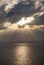 Sunset over the Aegean Sea over the islands in the cloudy sky Royalty Free Stock Photo