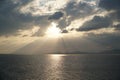 Sunset over the Aegean Sea over the islands in the cloudy sky Royalty Free Stock Photo