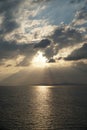 Sunset over the Aegean Sea over the islands in the cloudy sky Royalty Free Stock Photo