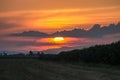 Sunset over agricultural fields Royalty Free Stock Photo