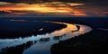 sunset over the amazon river. Sun rise. Areal view of the amazon rain forest vast river bed. Planet\'s lungs.