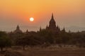 Sunset over ancient temples, pagodas and stupas in Old Bagan, Myanmar Peaceful Asian landscape with Buddhist temple silhouettes. Royalty Free Stock Photo