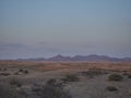 sunset over the arid landscape of the Kaokoveld Royalty Free Stock Photo