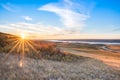 Sunset over autumn leaves on a hillside overlooking Lake Diefenbaker Royalty Free Stock Photo