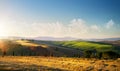 Sunset over autumn Tuscany countryside landscape; rolling hills and village Royalty Free Stock Photo