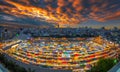 Sunset over Bangkok city business downtown and train night market Ratchada