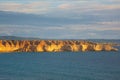 Sunset over beach cliffs