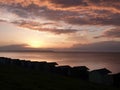 Sunset over beach huts at Whitstable Royalty Free Stock Photo