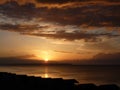 Sunset over beach huts at Whitstable Royalty Free Stock Photo