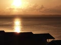 Sunset over beach huts at Whitstable Royalty Free Stock Photo