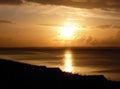 Sunset over beach huts at Whitstable Royalty Free Stock Photo