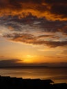 Sunset over beach huts at Whitstable Royalty Free Stock Photo