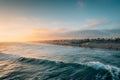 Sunset over the beach from the pier in Huntington Beach, Orange County, California Royalty Free Stock Photo