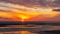 Sunset over the beach of Sankt Peter Ording Royalty Free Stock Photo