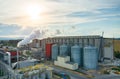 Sunset over biofuel factory Royalty Free Stock Photo