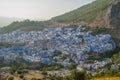 Sunset over the blue Moroccan town of Chefchaouen, as seen from the hill of the Spanish Mosque. Royalty Free Stock Photo