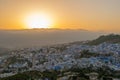 Sunset over the blue Moroccan town of Chefchaouen, as seen from the hill of the Spanish Mosque. Royalty Free Stock Photo