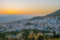 Sunset over the blue Moroccan town of Chefchaouen, as seen from the hill of the Spanish Mosque. Royalty Free Stock Photo