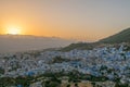 Sunset over the blue Moroccan town of Chefchaouen, as seen from the hill of the Spanish Mosque. Royalty Free Stock Photo