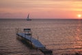 Sunset over a boat and small dock in Sister Bay in Door County, Wisconsin Royalty Free Stock Photo