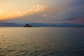 Sunset over Bourtzi castle in Nafplio, Greece. Royalty Free Stock Photo
