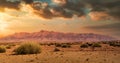 Sunset over Brandberg Namibia Travel destination. Dramatic sky. Royalty Free Stock Photo