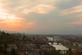 Sunset over bridges through the river Arno