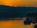 Sunset over calm Danube river  in Novi Sad, Serbia Royalty Free Stock Photo