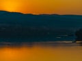 Sunset over calm Danube river  in Novi Sad, Serbia Royalty Free Stock Photo