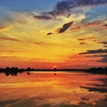 Sunset over calm lake Royalty Free Stock Photo