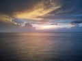 Sunset over calm ocean water Royalty Free Stock Photo