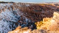Sunset over canyon slopes covered in snow, Bryce Canyon National Royalty Free Stock Photo