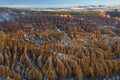 Sunset over canyon slopes covered in snow, Bryce Canyon National Royalty Free Stock Photo