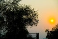 Sunset over car and road in countryside Royalty Free Stock Photo