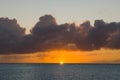 Sunset over Caribbean sea. Deep ocean view with waves and dark clouds. Relaxing seascape, endless sea, tropical waters background Royalty Free Stock Photo