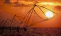 Sunset over Chinese Fishing nets in Cochin Royalty Free Stock Photo