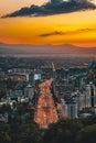 Sunset over the city of Almaty and a view of the Kok Tobe TV Tower