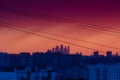 Sunset over the city from a high point. Contrast of blue and orange. Royalty Free Stock Photo